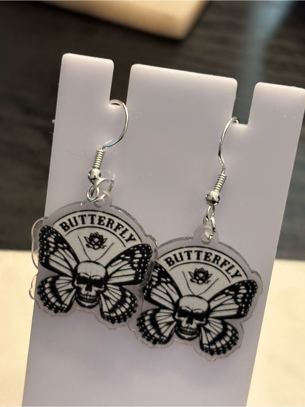 Title: Butterfly Skull Acrylic Dangle Earrings | Moth-Wing Skull + Lotus | Silve